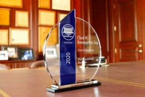 lawyers of distinction 2020 crystal award on desk